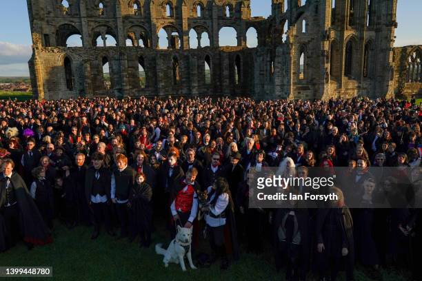 People dressed as vampires gather during a world record attempt for the largest gathering of vampires in one place at Whitby Abbey on May 26, 2022 in...