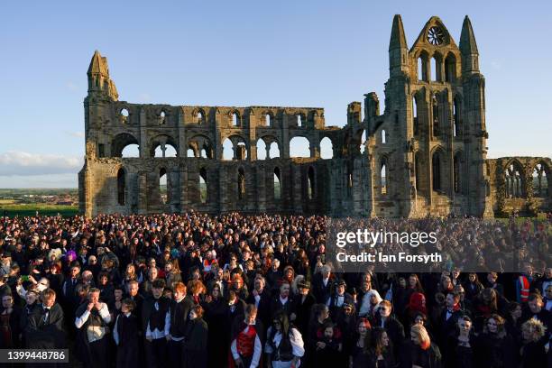 People dressed as vampires gather during a world record attempt for the largest gathering of vampires in one place at Whitby Abbey on May 26, 2022 in...