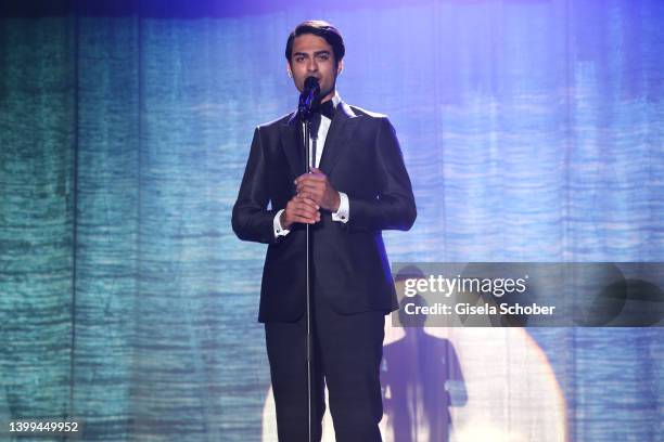 Matteo Bocelli sings during the amfAR Cannes Gala 2022 at Hotel du Cap-Eden-Roc on May 26, 2022 in Cap d'Antibes, France.