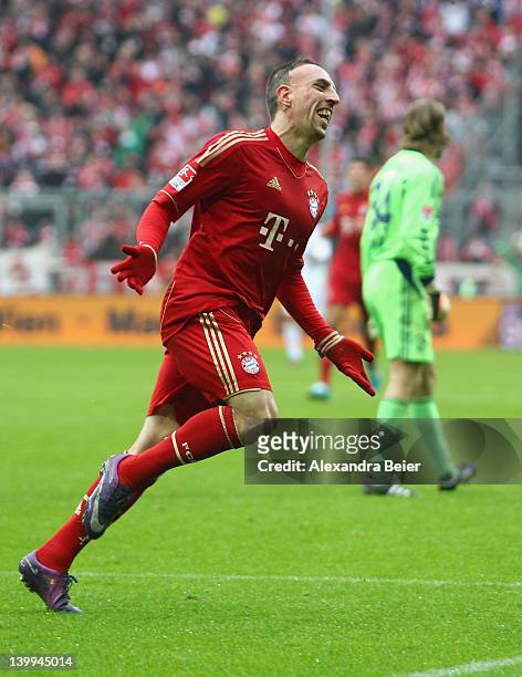 Franck Ribery of Bayern Muenchen celebrates his first goal against goalkeeper Timo Hildebrand of Schalke during the Bundesliga match between FC...