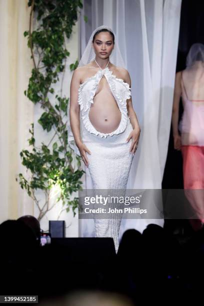 Shanina Shaik walks the runway in the fashion show during the amfAR Cannes Gala 2022 at Hotel du Cap-Eden-Roc on May 26, 2022 in Cap d'Antibes,...