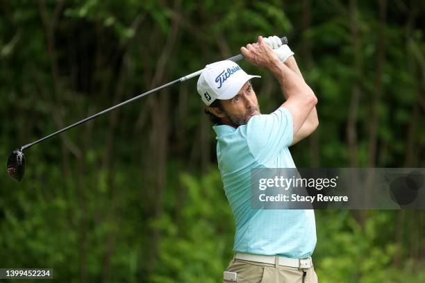 Mark Hensby of Australia hits his tee shot on the 15th hole during the first round of the Senior PGA Championship presented by KitchenAid at Harbor...