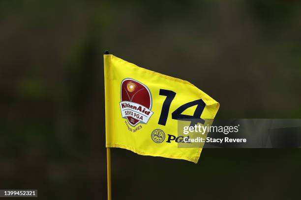 Detailed view of the flag pin on the 14th hole during the first round of the Senior PGA Championship presented by KitchenAid at Harbor Shores Resort...