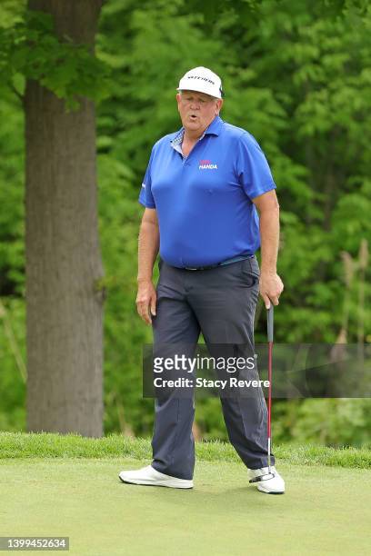 Colin Montgomerie of Scotland reacts to a putt on the 10th green during the first round of the Senior PGA Championship presented by KitchenAid at...