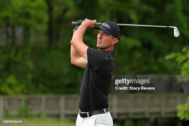 Mike Weir of Canada watches his tee shot on the 11th hole during the first round of the Senior PGA Championship presented by KitchenAid at Harbor...