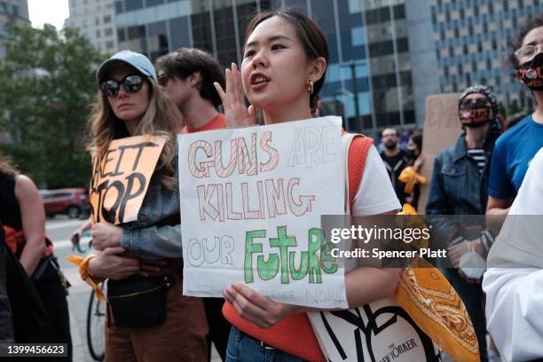 Gun rights activists, including the group Youth Over Guns, participate in a rally in Foley Square to demand an end to gun violence on May 26, 2022 in...