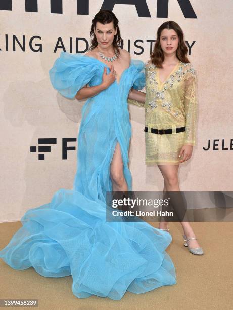 Milla Jovovich and Ever Gabo Anderson attend amfAR Gala Cannes 2022 at Hotel du Cap-Eden-Roc on May 26, 2022 in Cap d'Antibes, France.