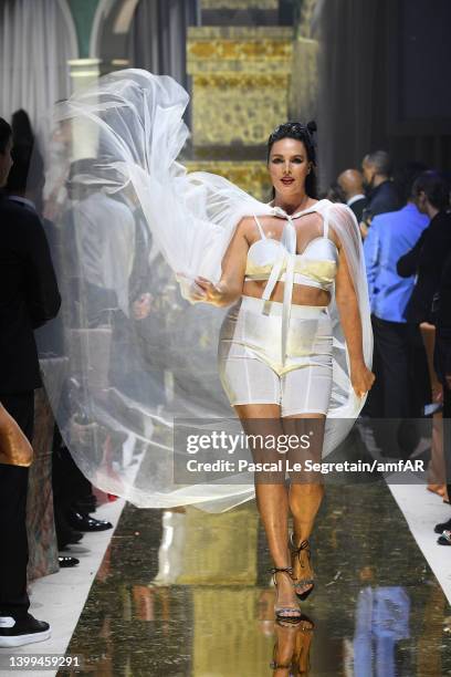 Candice Huffine walks the runway in the fashion show during the amfAR Cannes Gala 2022 at Hotel du Cap-Eden-Roc on May 26, 2022 in Cap d'Antibes,...