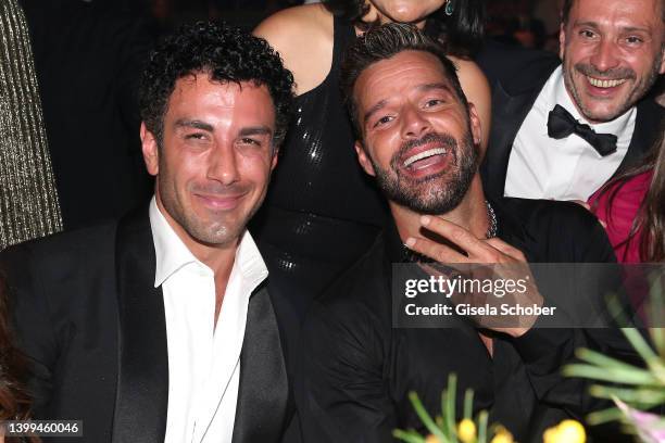 Jwan Yosef and Ricky Martin attend the amfAR Cannes Gala 2022 at Hotel du Cap-Eden-Roc on May 26, 2022 in Cap d'Antibes, France.