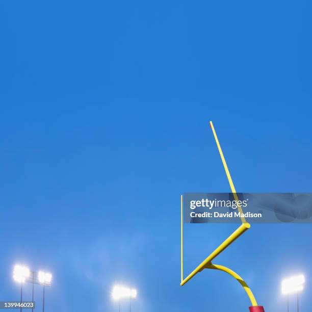 football goalpost and stadium lights. - haste da trave - fotografias e filmes do acervo