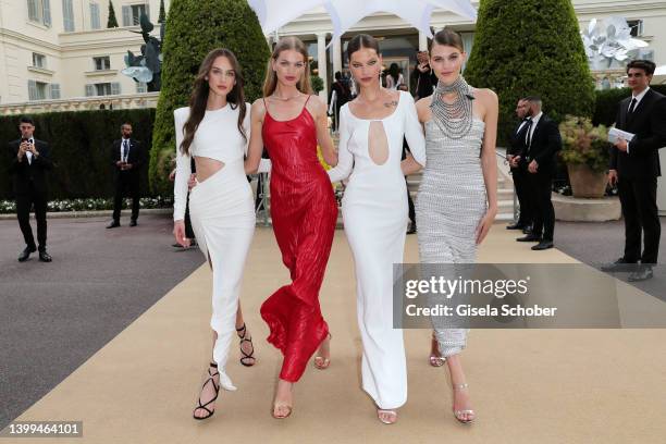 Daphne Groeneveld, Faretta and Madison Headrick attend the amfAR Cannes Gala 2022 at Hotel du Cap-Eden-Roc on May 26, 2022 in Cap d'Antibes, France.