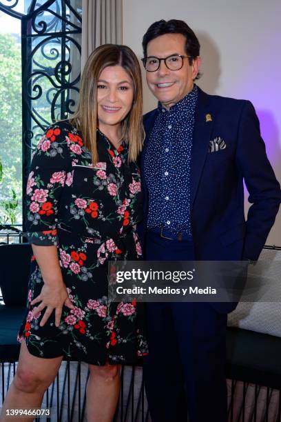 Tv Host Martha Figueroa and Juan José Origel poses for a photo during first anniversary celebration of the TV show "Con Permiso" on May 26, 2022 in...