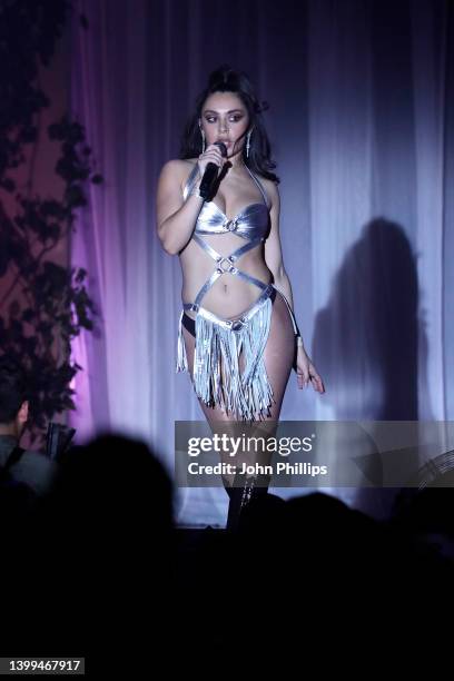 Charli XCX performs during the amfAR Cannes Gala 2022 at Hotel du Cap-Eden-Roc on May 26, 2022 in Cap d'Antibes, France.