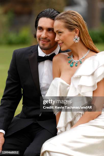 Petra Nemcova and Benjamin Larretche attends the amfAR Cannes Gala 2022 at Hotel du Cap-Eden-Roc on May 26, 2022 in Cap d'Antibes, France.