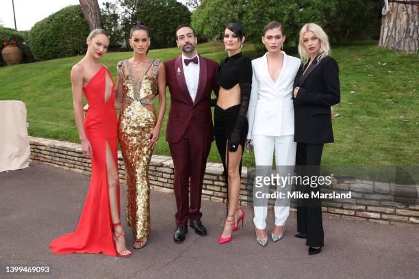 Candice Swanepoel, Izabel Goulart, Mohammed Al Turki, Isabeli Fontana, Valentina Sampaio and Stella Maxwell at Hotel du Cap-Eden-Roc on May 26, 2022...