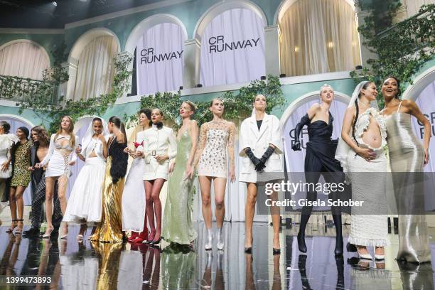 Models walk the runway in the fashion show during the amfAR Cannes Gala 2022 at Hotel du Cap-Eden-Roc on May 26, 2022 in Cap d'Antibes, France.