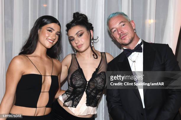 Charli D'Amelio, Charli XCX and Diplo attend the amfAR Cannes Gala 2022 at Hotel du Cap-Eden-Roc on May 26, 2022 in Cap d'Antibes, France.