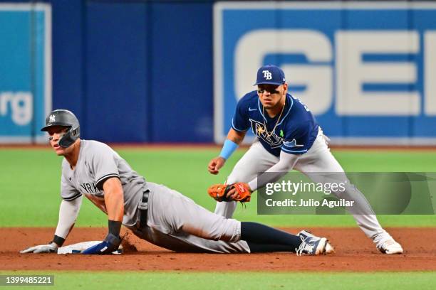 Aaron Judge of the New York Yankees steals second base against Isaac Paredes of the Tampa Bay Rays in the sixth inning at Tropicana Field on May 26,...