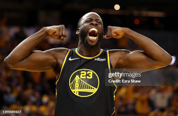 Draymond Green of the Golden State Warriors reacts after a basket and a foul call during the fourth quarter against the Dallas Mavericks in Game Five...