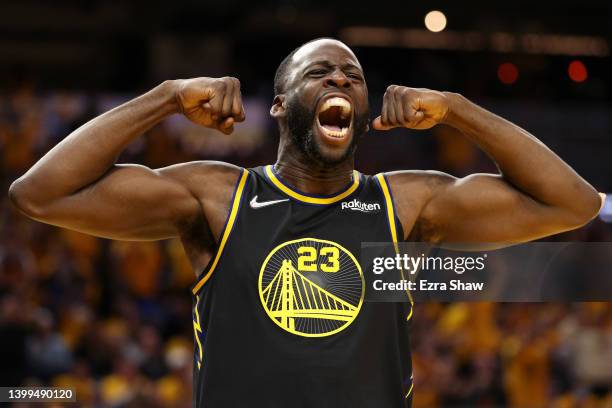 Draymond Green of the Golden State Warriors reacts after a basket and a foul call during the fourth quarter against the Dallas Mavericks in Game Five...