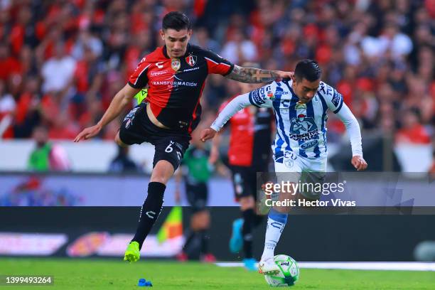 Edgar Zaldívar of Atlas fights for the ball with Erick Sanchez of Pachuca during the final first leg match between Atlas and Pachuca as part of the...