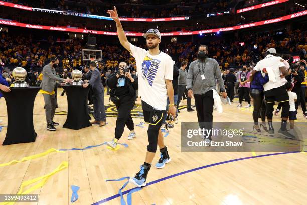 Stephen Curry of the Golden State Warriors celebrates after the 120-110 win against the Dallas Mavericks to advance to the NBA Finals in Game Five of...