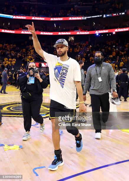 Stephen Curry of the Golden State Warriors celebrates after the 120-110 win against the Dallas Mavericks to advance to the NBA Finals in Game Five of...