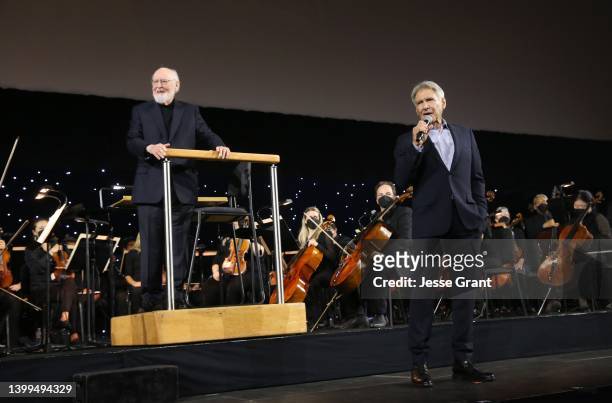 Harrison Ford of the upcoming fifth installment of the “Indiana Jones” franchise honors composer John Williams on his 90th birthday at Star Wars...