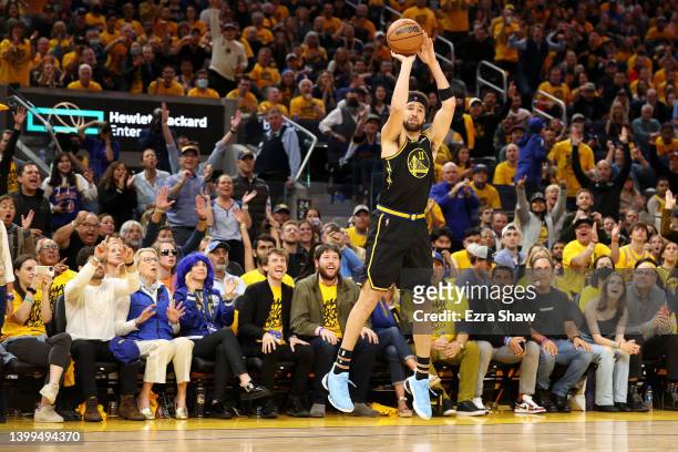 Klay Thompson of the Golden State Warriors shoots a three point basket during the fourth quarter against the Dallas Mavericks in Game Five of the...