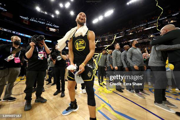 Stephen Curry of the Golden State Warriors celebrates after the 120-110 win against the Dallas Mavericks to advance to the NBA Finals in Game Five of...