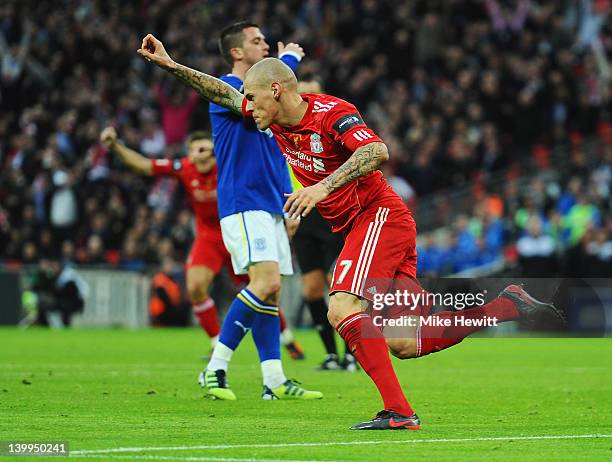 Martin Skrtel of Liverpool celebrates as he scores their first goal during the Carling Cup Final match between Liverpool and Cardiff City at Wembley...