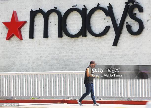 The Macy’s logo is displayed at a Macy’s store on May 26, 2022 in Los Angeles, California. Macy’s reported strong sales growth today and increased...