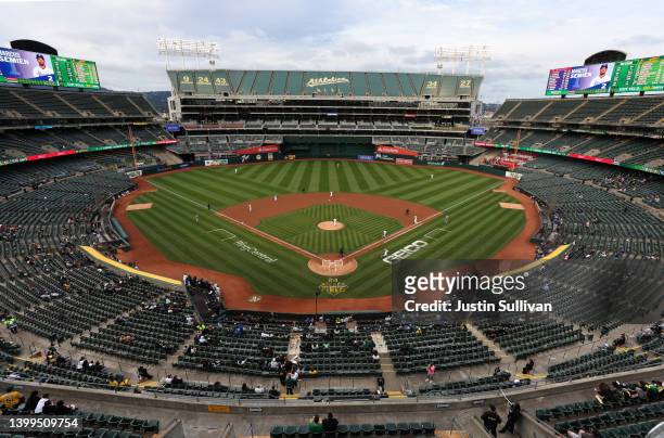 The Oakland Athletics play the Texas Rangers at a nearly empty RingCentral Coliseum on May 26, 2022 in Oakland, California. Attendance at Oakland...