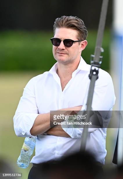 Former Australian cricketer Shane Watson looks on during the public memorial service for Andrew Symonds at Riverway Stadium on May 27, 2022 in...