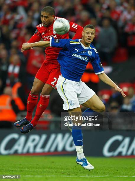 Glen Johnson of Liverpool battles with Rudy Gestede of Cardiff City during the Carling Cup Final match between Liverpool and Cardiff City at Wembley...