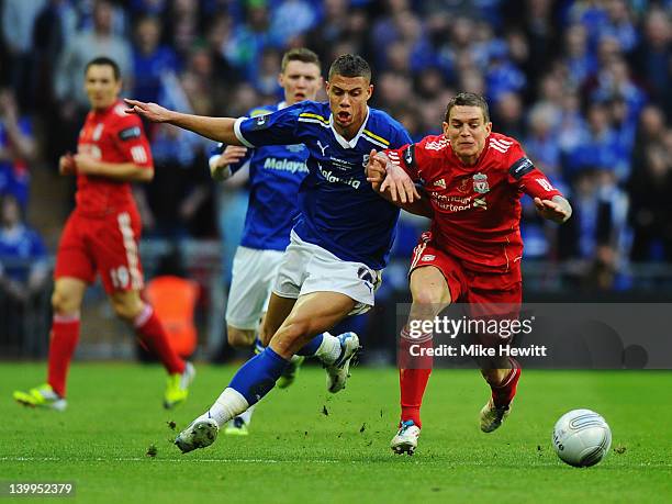 Daniel Agger of Liverpool battles with Rudy Gestede of Cardiff City during the Carling Cup Final match between Liverpool and Cardiff City at Wembley...