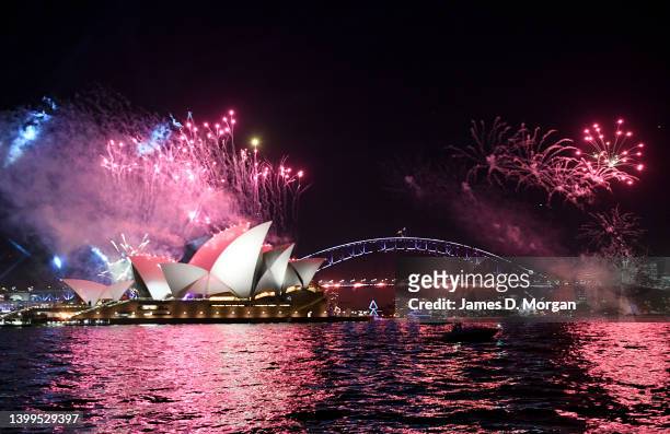 Fireworks and lights above the Sydney Opera House and Sydney Harbour Bridge for the opening of the Vivid Sydney festival on May 27, 2022 in Sydney,...
