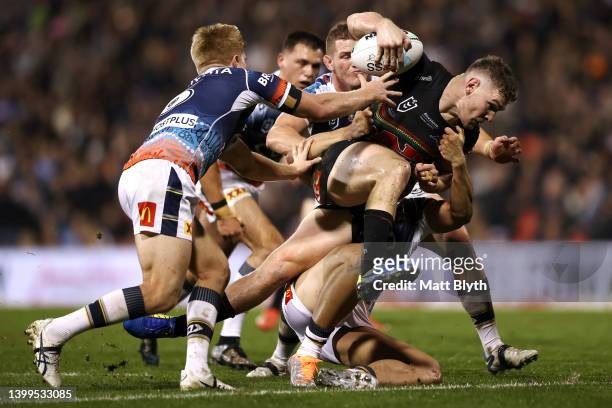 Liam Martin of the Panthers is tackled during the round 12 NRL match between the Penrith Panthers and the North Queensland Cowboys at BlueBet Stadium...