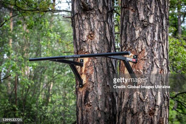 Horizontal bar attached to trees in a military camp of Territorial Defense Forces on May 19, 2022 in Kyiv, Ukraine. Russia’s first attack on Kyiv has...