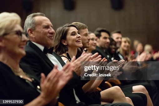 Spectators clapping in the theater, close up of hands Spectators clapping in the theater, close up of hands
