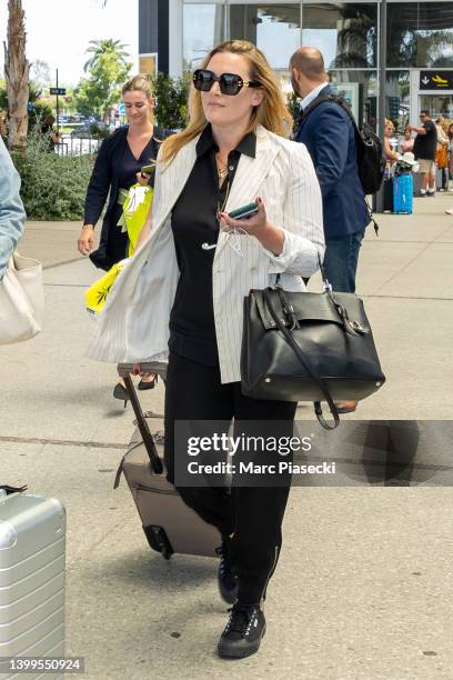 Actress Kate Winslet is seen arriving ahead of the 75th annual Cannes film festival at Nice Airport on May 27, 2022 in Nice, France.