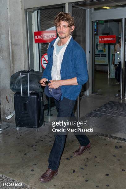 Actor Niels Schneider is seen arriving ahead of/ the 75th annual Cannes film festival at Nice Airport on May 27, 2022 in Nice, France.