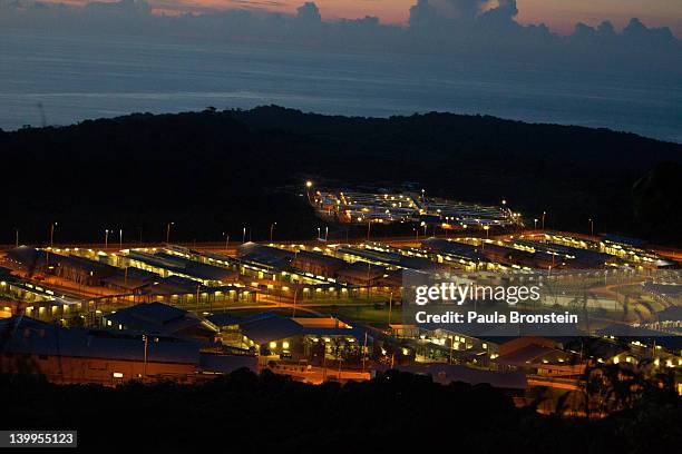The sun sets over the Immigration Detention Center February 25, 2012 on Christmas Island, Australia. So far in 2012 the total number of...