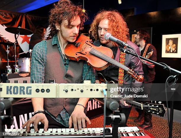 Musicians Jesse Kotansky and Nathanial Hoho of the band The Click Clack Boom performing at the Art Photographer of Mia Tyler exhibit at RIFF's WTF...