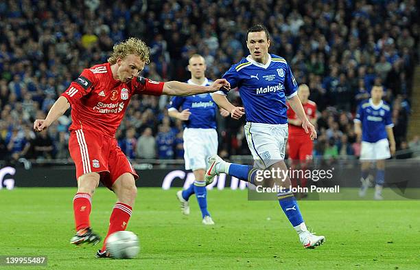 Dirk Kuyt of Liverpool scores his team's second goal during the Carling Cup Final match between Liverpool and Cardiff City at Wembley Stadium on...