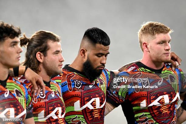 Payne Haas of the Broncos and team mates embrace during the round 12 NRL match between the Brisbane Broncos and the Gold Coast Titans at Suncorp...