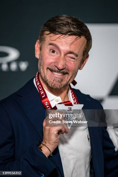 Max Biaggi of Italy shows his MotoGP Legend medal during a special ceremony during ahead of the MotoGP Gran Premio d’Italia Oakley at Mugello Circuit...