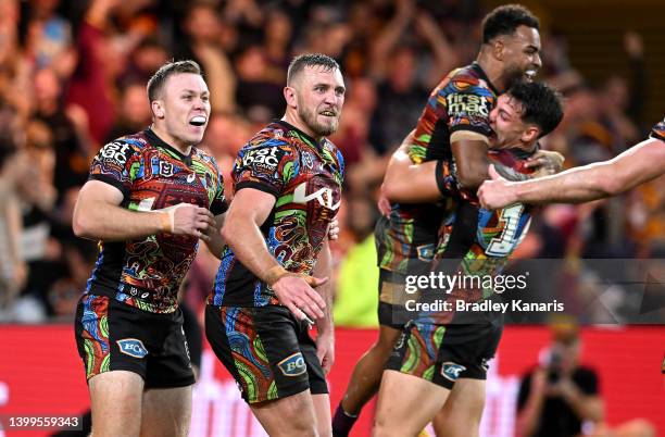 Kurt Capewell of the Broncos celebrates after scoring a try during the round 12 NRL match between the Brisbane Broncos and the Gold Coast Titans at...