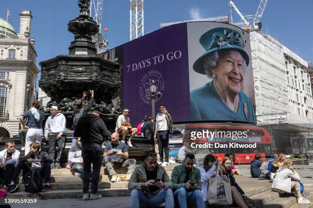 The illuminated display at Piccadilly Circus reads "7 Days To Go" in reference to the Queens Platinum Jubilee on May 27, 2022 in London, England....