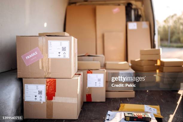 Behind Stack Of Boxes Photos and Premium High Res Pictures - Getty Images